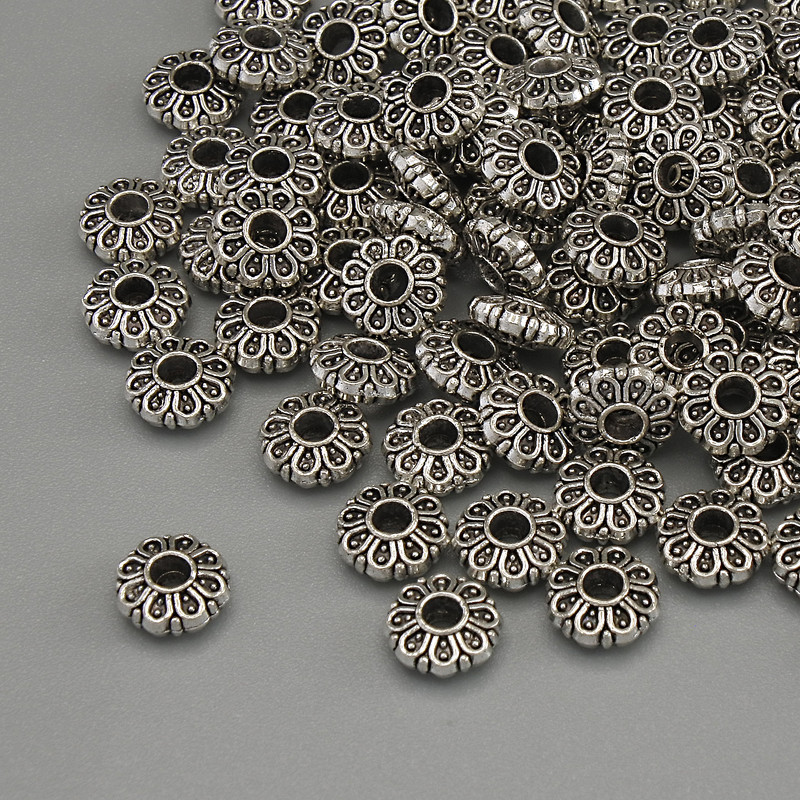 Findings Bead Spacer, silver metal colour, diameter 6x2.5mm +/-, hole diameter 2mm +/-, packaging 20g (~94 pcs)