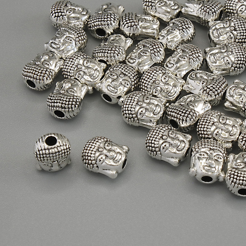 Findings Buddha Bead Spacer, silver metal colour, diameter 6x7x4mm +/-, hole diameter 1.9mm +/-, packaging 20g (~31 pcs)