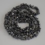 Hematite Chip Beads, diameter 4-10x2-5mm+-, length 78cm+- on nylon thread