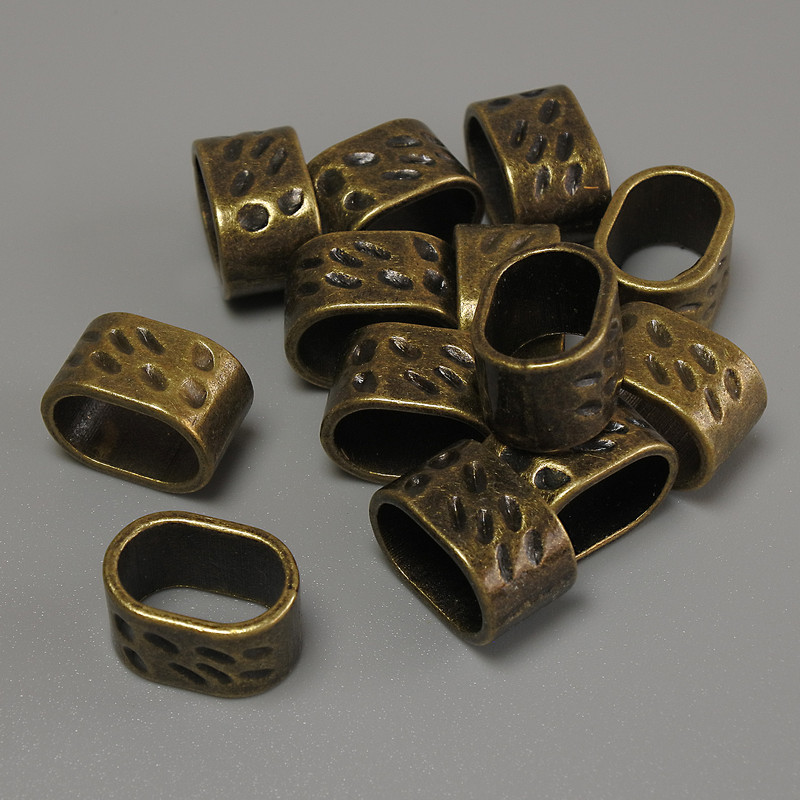 Findings Row Spacer Insert bronze metal colour, diameter 13x9mm+- hole diameter 11x7mm+- pack 20g (~13pcs)
