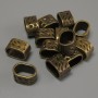 Findings Row Spacer Insert bronze metal colour, diameter 13x9mm+- hole diameter 11x7mm+- pack 20g (~13pcs)