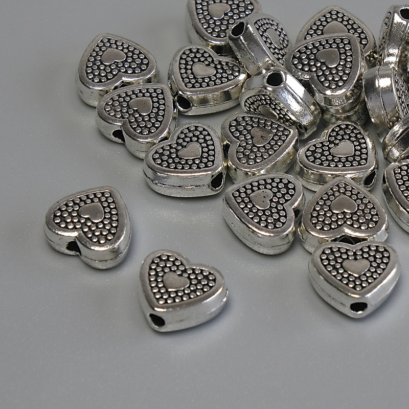 Findings Heart Spacer Bead, Silver Metal Colour, Diameter 8.5x7.5mm +/-, Hole 2mm +/-, Pack 20g (~21pcs)