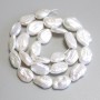 Baroque pearls with a petrol-tone, on thread, diameter 15-18×10-12 mm +/-, length 39 cm+