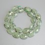 Prehnite Beads Oval, diameter 18x13mm+/- on thread, length 40cm+