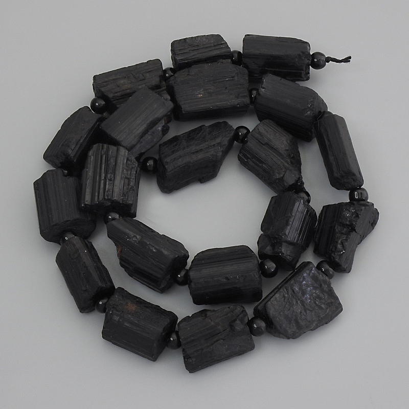Schorl Tourmaline Beads, raw stone, diameter 15-18x10-12mm+- with 4,5mm+- seed beads on a strand, length 41cm+