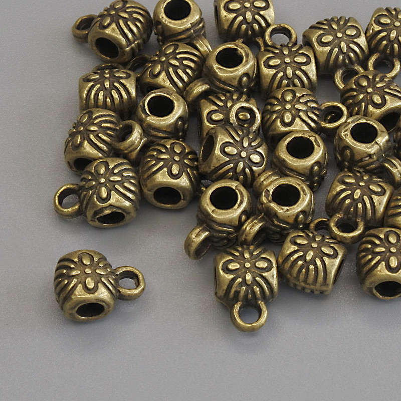 Findings Bail bronze metal colour, size 8.5x6mm+/- holes, diameter 2.8mm+/-, diameter 1.8mm+/- pack 20g (~28pcs)