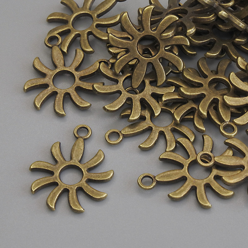 Pendant Charm Sun bronze metal colour, diameter 18x15mm+/- pack of 22pcs