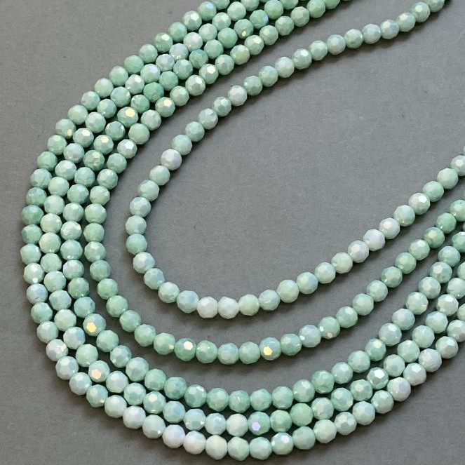 Czech Crystal Beads light green on a strand, faceted round bead, diameter 6mm +/-, length 38cm +