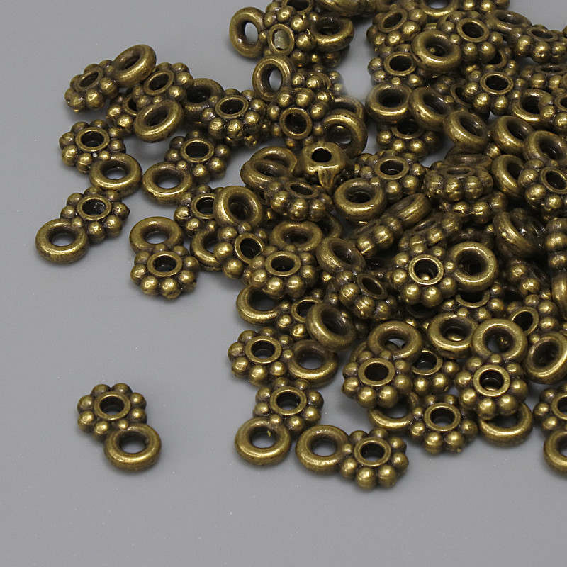 Pendant Bronze Metal Colour, diameter 7x4.5mm+- loop hole 1.5mm+-, pack of 84pcs+