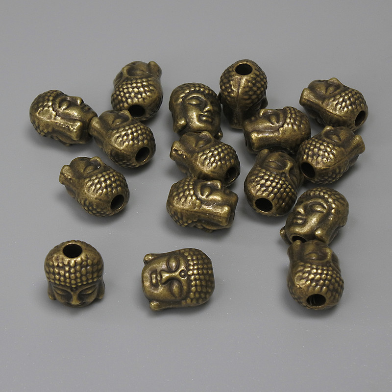 Findings Buddha Spacer Bead Bronze-Tone Metal, diameter 9x7mm+-, hole diameter 2.4mm+-, pack of 16pcs+