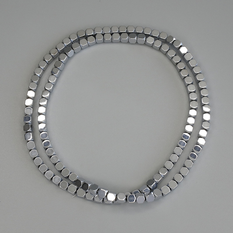 Hematite beads silver color facets 4x4mm ± on thread, length 40cm+