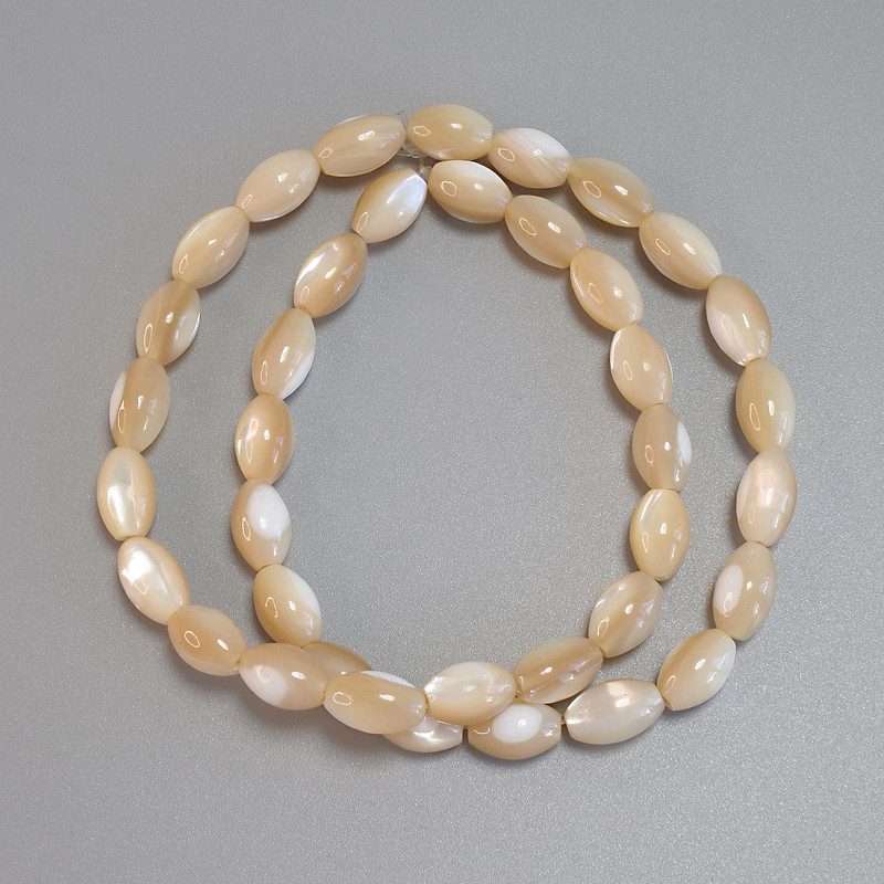 Mother-of-Pearl Beige Grain Beads, Diameter 10-11x6.5mm+- Length 40cm+- on Fishing Line