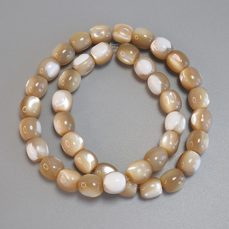 Mother-of-Pearl Beige Barrel Beads, Diameter 10x9.5mm+- Length 40cm+- on Fishing Line