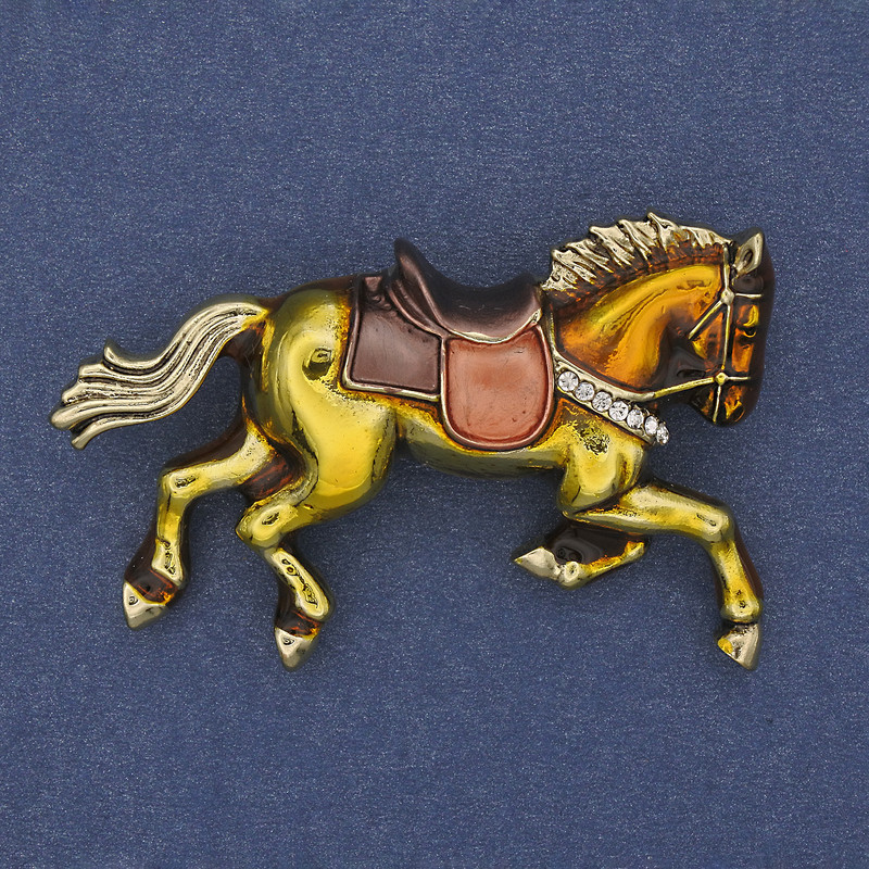 Brooch 'Horse' with yellow enamel and white crystals, golden metal 50x32mm