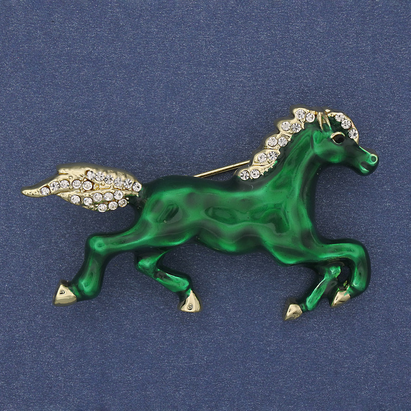Brooch Horse with green enamel and white rhinestones, gold-tone metal 50x32mm+