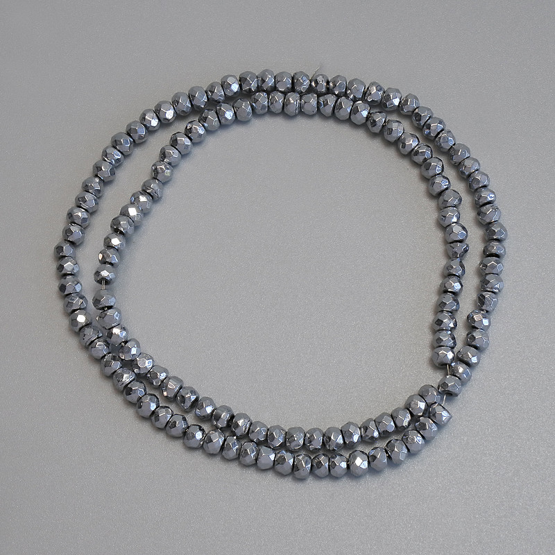 Hematite beads, silver-colour, faceted rondelle 4×3mm± on thread, length 38cm+