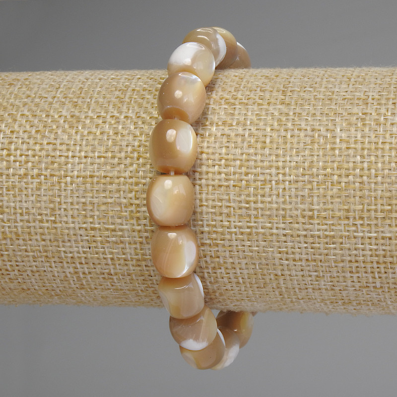 Bracelet Mother-of-Pearl Barrel, diameter 10x9.5mm+-, length 18cm stretch