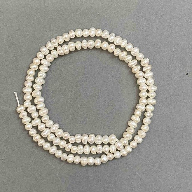 Freshwater pearl beads 3×4 mm, on a thread, 35 cm approximate