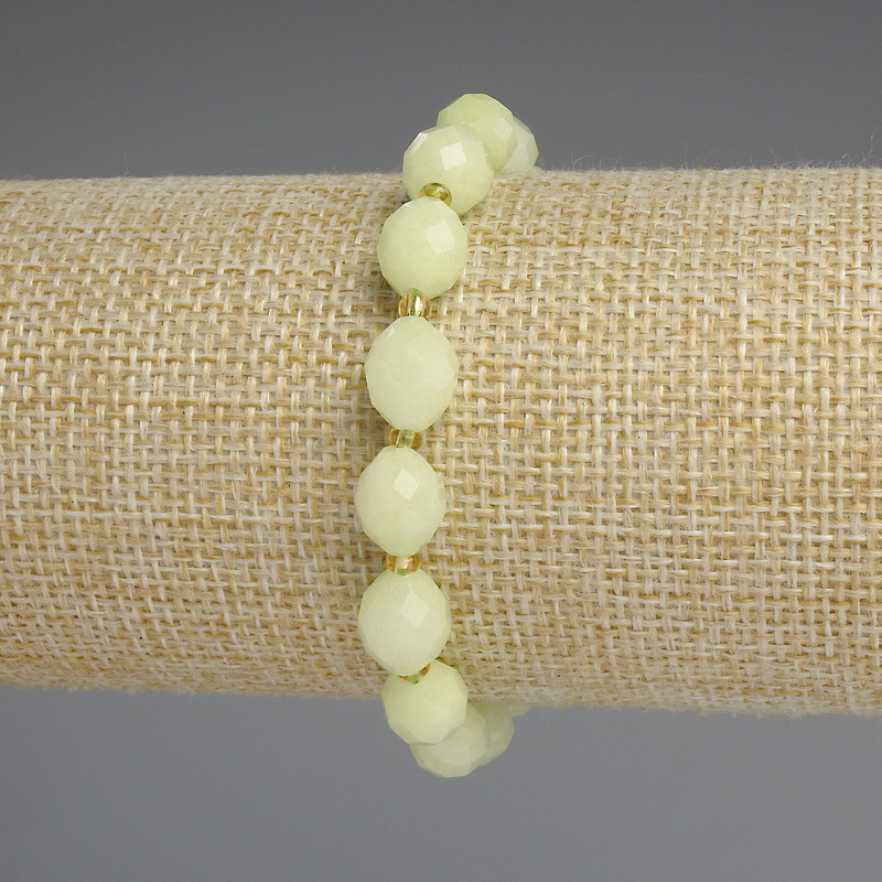 Chrysolite Olivine Bracelet, Faceted Grain Beads 10x8mm+- with Bicone Spacers 3mm+-, length 18cm+- stretch