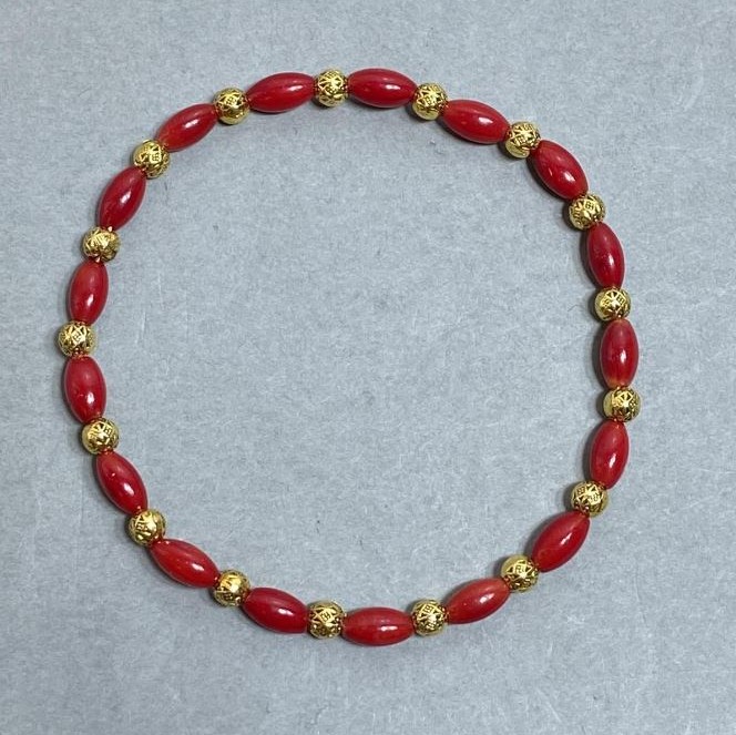 Coral Grain Bracelet, 8x4mm+/- with Metal Insets, Length 18mm+/- Stretch