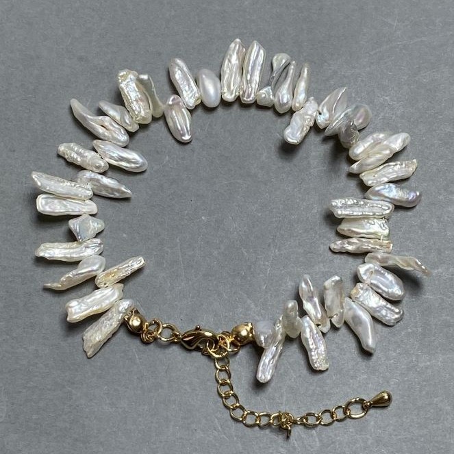 Baroque Pearl Bracelet 10-13x4-5mm+-, length 18cm +5cm chain