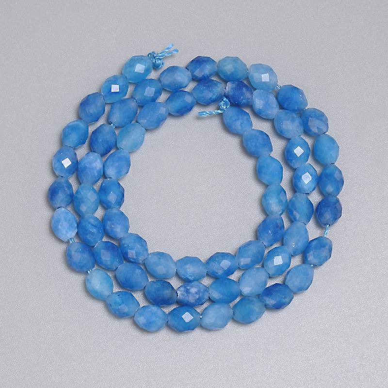 Aquamarine Beads Faceted Grain 8x5mm+/-, length 37cm+/- on a thread