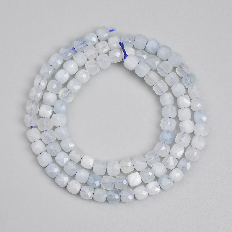 Aquamarine Beads, faceted cube 4x4mm+/-, length 39cm+/- on a strand