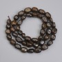 Bronzite Beads, Tumbled 6-11x5.5-7.5mm +-, length 40cm+- on a thread