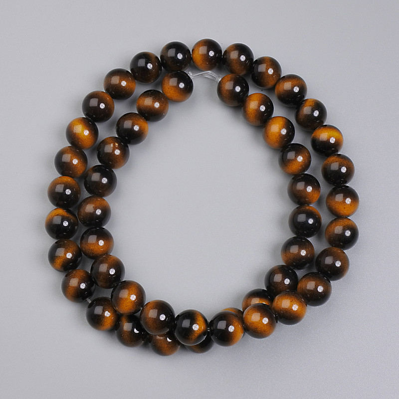 Tiger's Eye (Pressed) Smooth Round Beads, diameter 8mm+- on fishing line, length 38cm+