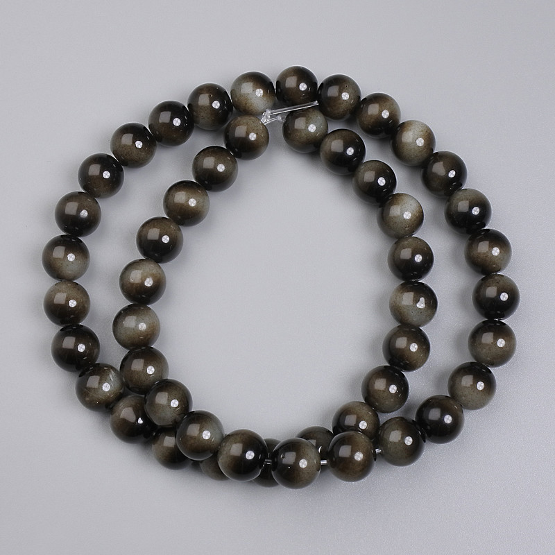 Grey Tiger's Eye (Pressed) Smooth Round Beads, diameter 8mm+- on fishing line, length 37cm+