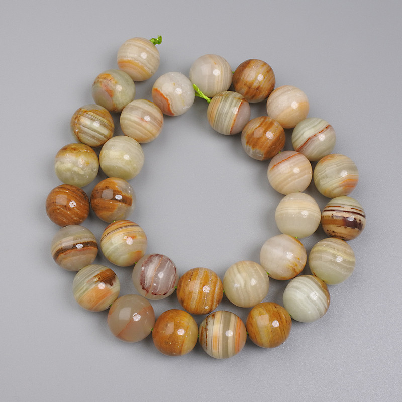 Onyx Beads, smooth round, diameter 12mm+- on a strand, length 39cm+