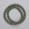 Green Volcanic Lava Beads, round, diameter 8mm+/-, on a strand, length 38cm+