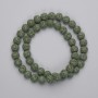 Green Volcanic Lava Beads, round, diameter 8mm+/-, on a strand, length 38cm+