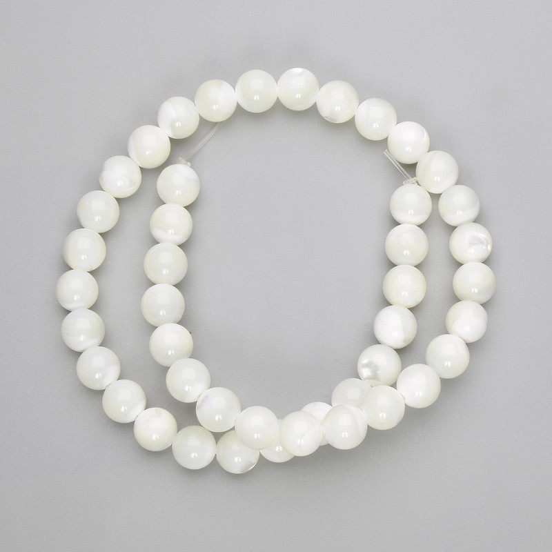 Mother-of-P pearl beads smooth round 9mm diameter, 39cm length on fishing line