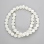 Mother-of-P pearl beads smooth round 9mm diameter, 39cm length on fishing line