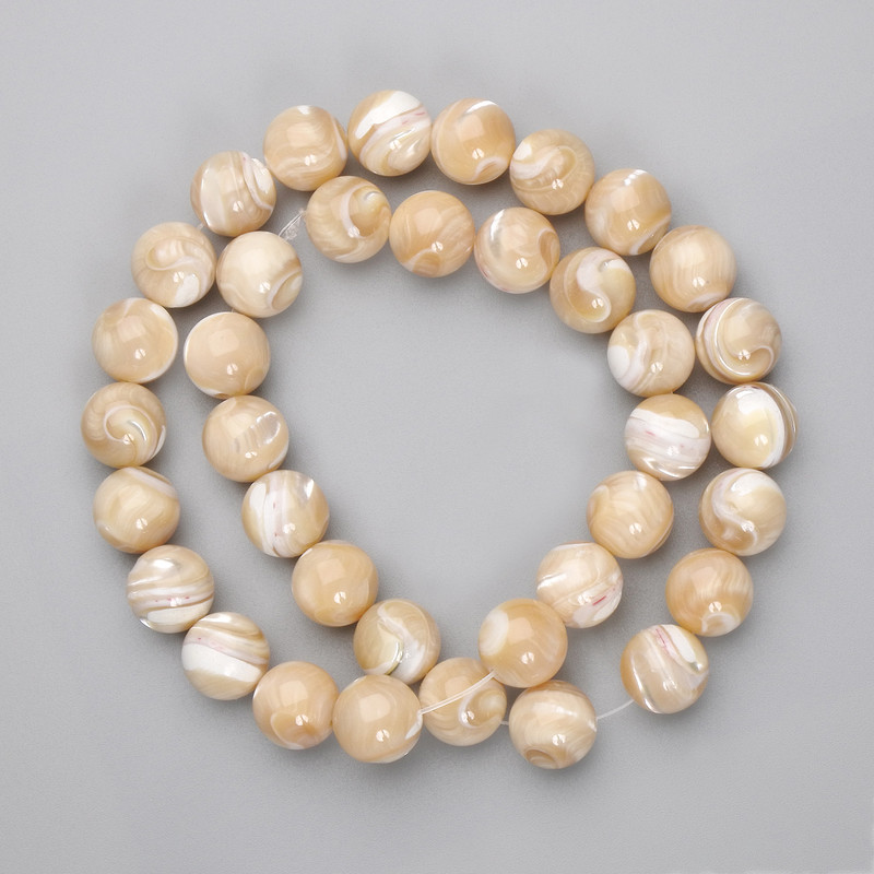 Beige Mother-of-P pearl beads smooth ball shape diameter 10.5mm±, length 39cm± on mono filament