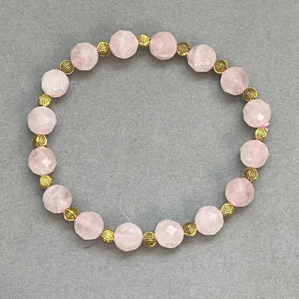 Bracelet Pink Quartz faceted ball, diameter 8mm± with metal inserts, length 18cm± stretch