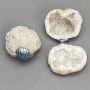 Souvenir pair geode of rock crystal on metal clamp, approx 50x45x35mm each