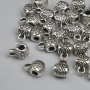 Ball end crimp/loop findings in silver-colour metal, size 8x4.5mm, holes 2–3mm, packaging 26 pieces