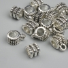 Silver-colour bail finding, size 6.5×9.5 mm ± hole diameters 2.2 mm and 4.6 mm ± packing 18 pcs