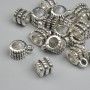 Silver-colour bail finding, size 6.5×9.5 mm ± hole diameters 2.2 mm and 4.6 mm ± packing 18 pcs