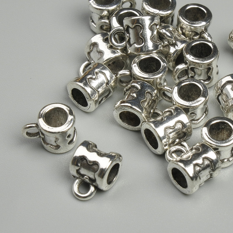 Metal finish bail silver colour, size 6x8mm±, holes 2.2mm and 4mm±, packaging 19 pcs