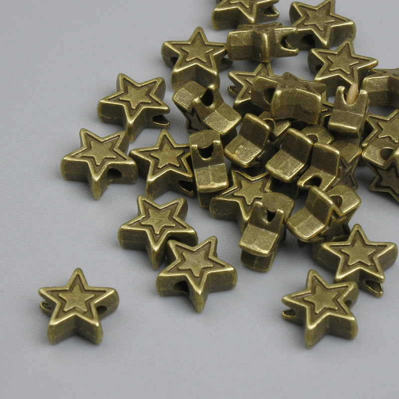 Bead finding star inlay bronze colour, diameter 6×2.5 mm ± hole 1.5 mm, packaging ~25 pcs
