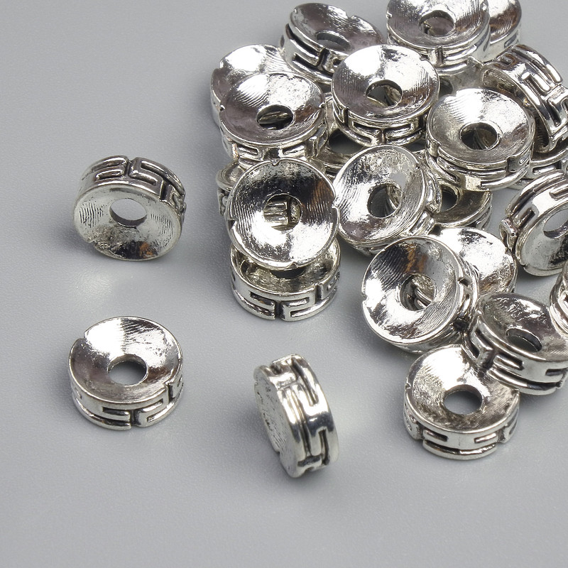 Bead finding insert, metal colour silver, diameter 7×3mm±, hole diameter ~2.2mm, packaging ~28pcs