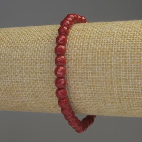 Bracelet Coral, faceted pellets, 6mm diameter ±, length 18cm stretch