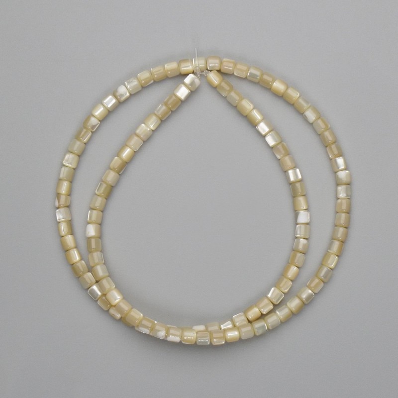 Beige Pearlized Beads Cylindrical 3.5mm diam, 39cm+/- on beading thread