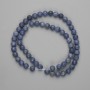 Holey-spongy coral beads smooth ball 6mm+-, length 37cm+- on fishing line
