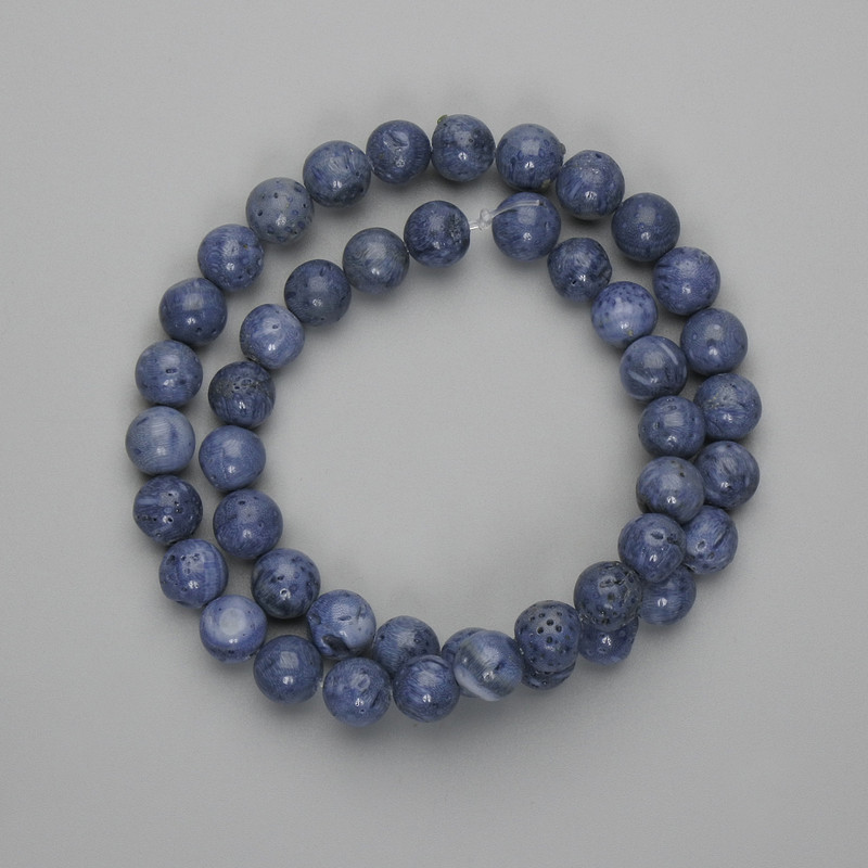 Hollow coral beads 8mm smooth sphere +-, length 38cm +- on filament