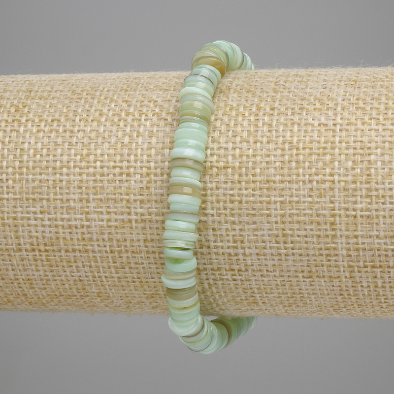 Bracelet with Seashell Scarface Rondelle, diameter 6x1-1.5mm+, length 18cm+-, stretch
