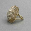 Bezel stud with Rutilated Quartz shard 30x26mm± golden metal